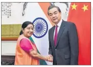  ?? REUTERS ?? External affairs minister Sushma Swaraj with Chinese foreign minister Wang Yi in Beijing on Sunday.