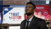  ?? CHARLES REX ARBOGAST — THE ASSOCIATED PRESS ?? Arizona’s DeAndre Ayton poses for a portrait before the NBA basketball draft lottery Tuesday in Chicago.