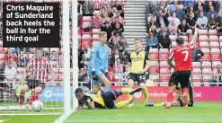  ??  ?? Chris Maguire of Sunderland back heels the ball in for the third goal