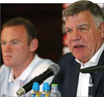  ??  ?? FOCUSED: Allardyce (right) yesterday with captain Rooney who is set to earn a record-breaking 116th cap against Slovakia