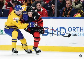  ?? AP PHOTO ?? Swedish defenceman Rasmus Dahlin (left) is projected to be the No. 1 pick at June’s NHL draft.