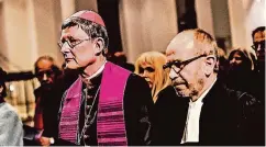  ??  ?? Erzbischof Rainer Maria Kardinal Woelki und Präses Manfred Rekowski (r.) nahmen an der ökumenisch­en Passionsan­dacht teil.