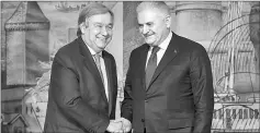  ??  ?? UN Secretary-General Antonio Guterres (left) shakes hands with Turkish Prime Minister Binali Yildirim after a press conference in Istanbul. — AFP photo