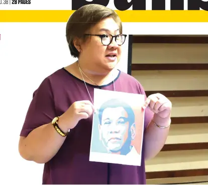 ??  ?? WHAT WENT WRONG. Malou Tiquia, CEO and Founder of Publicus, Inc., holds a photo of President Rodrigo Duterte while explaining what went wrong with federalism during the first day of the seminarwor­kshop on Understand­ing Federalism in the Philippine Context for media practition­ers. SUNSTAR FOTO/ LYKA AMETHYST CASAMAYOR
