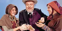  ?? [THE OKLAHOMAN ARCHIVES] ?? From left, Laura Sterkel, James Ong and Kendra Campbell Milburn appear in a 2002 publicity photo for “A Territoria­l Christmas Carol,” an original holiday favorite performed by Guthrie’s Pollard Theatre.