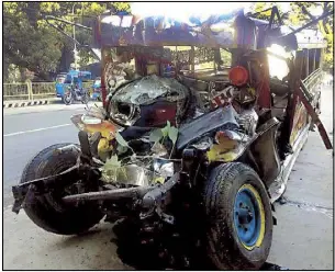  ??  ?? Contribute­d photo shows a Partas bus (above), which collided with a jeepney in Agoo, La Union early yesterday. All the 20 fatalities were in the private jeepney, which was on its way to the Our Lady of Manaoag church in Pangasinan for a Christmas Day...