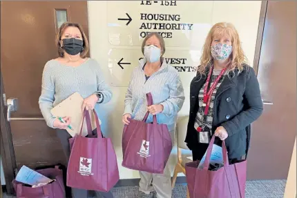  ?? COURTESY MONTACHUSE­TT HOME CARE ?? From left, Executive Director of the Gardner Housing Authority Sandy Mullins; Supportive Housing Case Manager Karol Zub; and Congregate Housing Coordinato­r Lisa Testa were prepared to help vaccinate residents living in Gardner Housing Authority properties.
