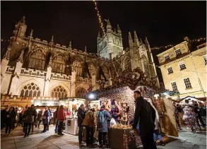  ?? Matt Cardy/getty Images ?? Visitors browse stalls at the Christmas Market in 2018