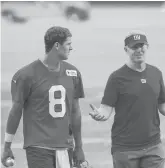  ?? COREY SIPKIN/AP ?? Giants quarterbac­k Daniel Jones speaks with then-offensive coordinato­r Jason Garrett at training camp July 28 in East Rutherford, N.J.