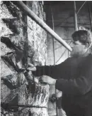  ??  ?? John Poole working on the Rotunda relief in 1964, and, left, the completed work, which is now in the middle of a Zara shop