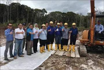  ??  ?? Gerawat (second right) and others give their thumbs-up for Bario rural water supply project. Also seen are (front, from third right) Dr Rundi, Dr Abdul Rahman, Alice and Sherrina.