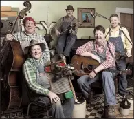  ??  ?? The Tennessee Mafia Jug Band — (clockwise from top left) Dan Kelly, Mike Webb, Mike Armistead, Ernie Sykes, Leroy Troy — performs Monday in Paragould.