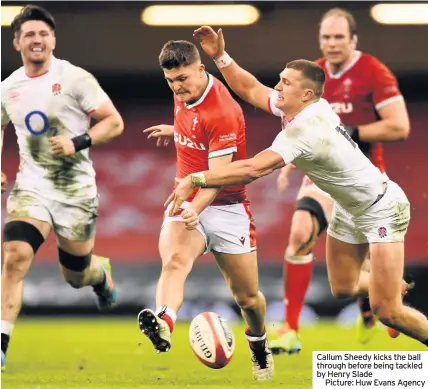  ??  ?? Callum Sheedy kicks the ball through before being tackled by Henry Slade
Picture: Huw Evans Agency