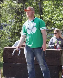  ?? Contribute­d Photo ?? Horseshoes: Hunter Raney competed in the horse shoe tournament at Hogskin Holidays in 2016.