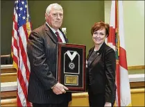  ?? FDLE ?? Ex-West Palm officer Ernie George, with Florida Department of Law Enforcemen­t Assistant Commission­er Jennifer Pritt, was inducted to the Florida Law Enforcemen­t Officers Hall of Fame on May 19.