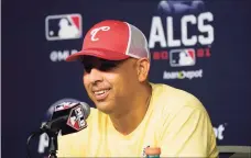  ?? Tony Gutierrez / Associated Press ?? Boston Red Sox manager Alex Cora smiles as he responds to questions during a news conference.