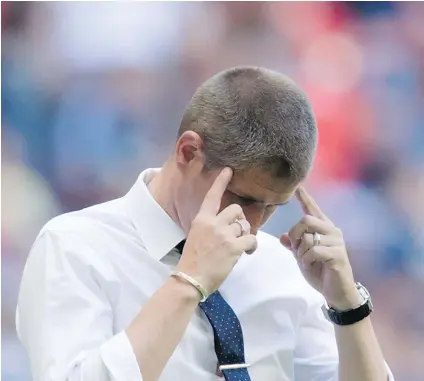  ?? — THE CANADIAN PRESS FILES ?? Whitecaps’ manager Carl Robinson was more than a little frustrated with the quality of refereeing during Saturday’s MLS match against D.C. United in Vancouver.