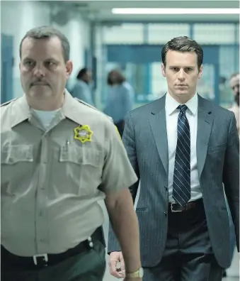  ?? NETFLIX ?? Jonathan Groff, right, known for his roles on Looking and Glee, stars in Netflix’s new series, Mindhunter.