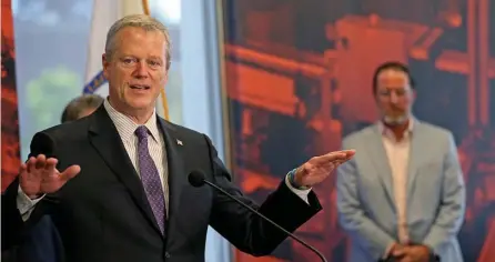  ?? MATT STONE PHOTOS / HERALD STAFF ?? SAFETY FIRST: Gov. Charlie Baker called the continued decline in the positive test rate a ‘promising trend’ on Wednesday.