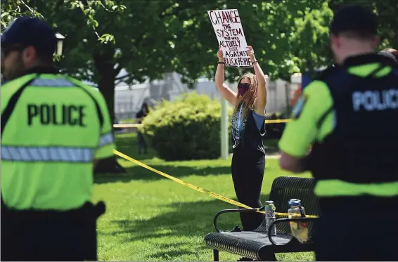  ?? Erik Trautmann / Hearst Connecticu­t Media file photo ?? More than 100 demonstrat­ors gather to protest police brutality after the death of George Floyd on May 30, 2020, at City Hall in Stratford.