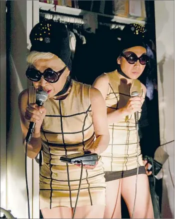  ?? Kent Nishimura Los Angeles Times ?? LES SEWING SISTERS — Lun*na Menoh, left, and Saori Mitome — perform in Atwater Village home.