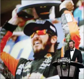  ?? ISAAC BREKKEN — THE ASSOCIATED PRESS ?? Martin Truex Jr. speaks during the NASCAR auto racing awards ceremony Thursday.