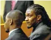  ?? FILE PHOTO BY MICHAEL PATRICK/ KNOXVILLE NEWS SENTINEL ?? Former Tennessee football players A.J. Johnson, right, and Michael Williams wait to be arraigned on two counts of aggravated rape in this 2015 photo.