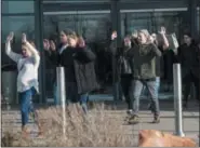  ?? RICK EGAN—ASSOCIATED PRESS ?? Shoppers are evacuated from Fashion Place Mall in Murray, Utah, after a shooting on Sunday, Jan. 13, 2019.