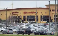  ?? H John Voorhees III / Hearst Connecticu­t Media file photo ?? Cars fill a parking lot at the Danbury Fair mall on Black Friday, Nov. 27, 2020.