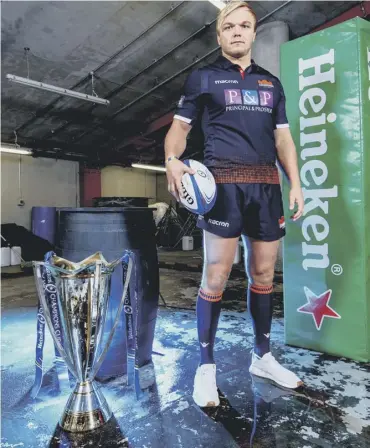  ??  ?? 0 Edinburgh back-rower Luke Hamilton with the Champions Cup at yersterday’s Dublin launch.