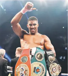  ?? — Reuters photo ?? Anthony Joshua celebrates after defeating Carlos Takam at Principali­ty Stadium, Cardiff, Britain in this Oct 28 file photo.