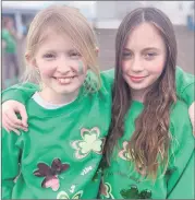  ?? ?? Ella Murphy and Lydia Duffy, pupils at Ballindang­an National School, nicely attired in the run up to St Patrick’s Day, as the school turned green in honour of our patron saint.