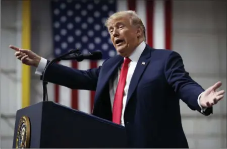  ?? CAROLYN KASTER — THE ASSOCIATED PRESS ?? President Donald Trump speaks at a campaign rally at Atlantic Aviation in Moon Township, Pa. Weeks after prodding lawmakers to stand up to the National Rifle Associatio­n, Trump is backing off his call for increasing the minimum age to buy an assault...