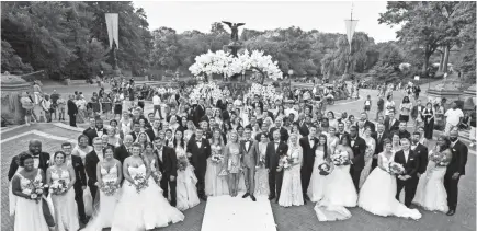  ?? TRAE PATTON/TLC ?? “Say Yes to the Dress: America” hosted a wedding in Central Park on July 10 for dozens of couples.