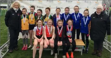  ??  ?? Tara O’Connor, Grainne Moran, Meabh O’Connor and Abaigh Moonan in the red of Dundalk St Gerard’s AC after winning the U-12 girls 4 x 500m relay at the All-Ireland Championsh­ips in DKIT.