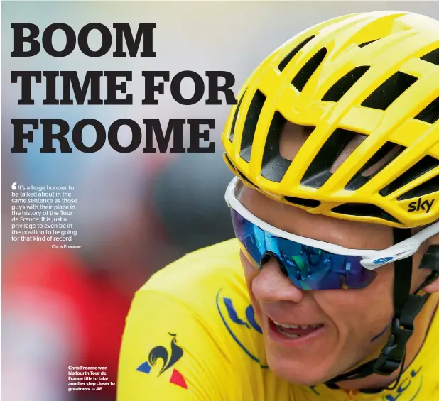  ?? AP ?? Chris Froome won his fourth Tour de France title to take another step closer to greatness. —