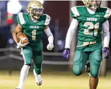  ?? ?? Catholic Central High School junior running back Daniel Kamara carries the ball against St. Bernard Elmwood Place. The Irish won 33-0. Kamara was named to the Division
VII Southwest District first team offense.