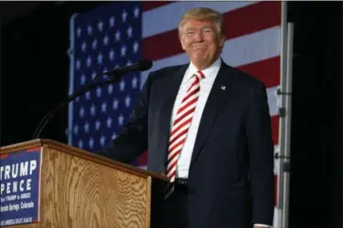  ?? EVAN VUCCI — THE ASSOCIATED PRESS ?? Republican presidenti­al candidate Donald Trump pauses as he speaks during a campaign rally, Tuesday in Colorado Springs, Colo.