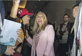  ?? Kent Nishimura Los Angeles Times ?? MARJORIE TAYLOR GREENE, at CPAC in National Harbor, Md., earlier this month, was a constant presence at Trump’s rallies during the midterm campaign.
