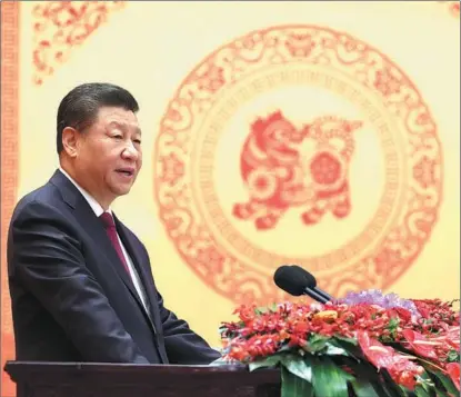  ?? JU PENG / XINHUA ?? President Xi Jinping delivers a speech on Jan 30 at a gathering at the Great Hall of the People in Beijing in which he spoke of China’s achievemen­ts in the past year and extended Spring Festival greetings to all Chinese at home and abroad.