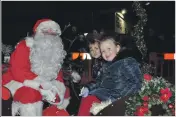 ?? 15_T47_ObanWinter­Festival08 ?? Riding on Santa’s sleigh were Elin Maclean and Lois MacLean.