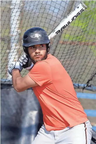  ?? RICK WOOD / MILWAUKEE JOURNAL SENTINEL ?? Milwaukee Riverside’s Antonio Valadez takes a few swings in the batting cage during practice. He has been dominant on the mound, pitching a five-inning no-hitter to go along with his 0.76 ERA.