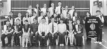  ??  ?? Leo Club members with Wong Hiong Foo (fourth right, first row) and teachers.