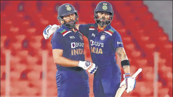  ?? GETTY IMAGES ?? Rohit Sharma (L) will likely to replace Virat Kohli as India captain in the shortest format of the game.