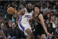  ?? ERIC GAY — THE ASSOCIATED PRESS ?? Sixers guard James Harden, left, pressured by San Antonio’s Isaiah Roby Friday night, may not be an All-Star in 2023, but that will mean little if he ends up starring in a deep postseason run.