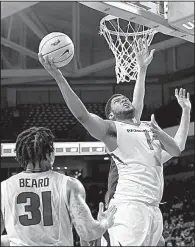  ?? NWA Democrat-Gazette/J.T. WAMPLER ?? Arkansas senior forward Trey Thompson (right) had 8 points, 6 rebounds and 2 assists off the bench Saturday at Auburn.