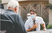  ?? KEVIN LIGHT / REUTERS ?? Liberal Leader Justin Trudeau visits a veterans'
retirement home in Victoria, B.C., on Thursday.