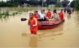  ?? — PTI ?? Unikuti district collector and superinten­dent of police visit the flood- affected area at a village in Kailashaha­r, Tripura, on Thursday.