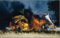  ?? NHAT V. MEYER — STAFF PHOTOGRAPH­ER ?? A tent catches fire in May near West Hedding and Spring streets in San Jose. Firefighte­rs responded to 1,573 fires related to homeless camps in the fiscal year, up 27% from the prior year.