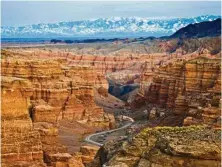  ??  ?? Aptly dubbed the ‘mini Grand Canyon’, the Charyn Canyon features amazing rock formations in pink and orange hues.